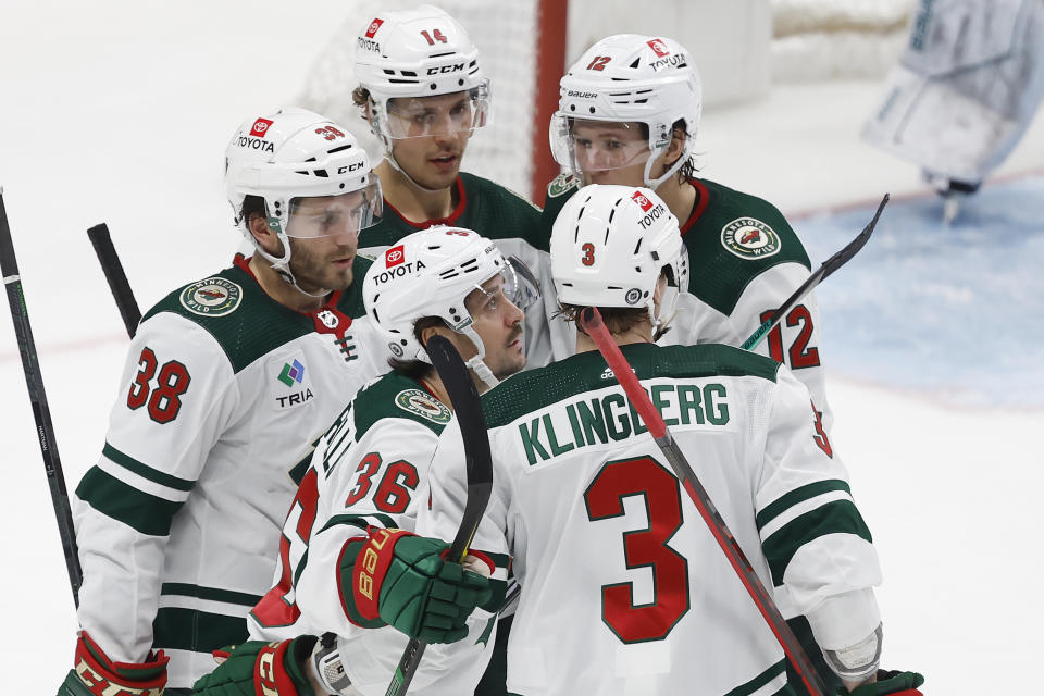 Minnesota Wild right wing Mats Zuccarello (36) and teammates celebrate his goal against the San Jose Sharks during the third period of an NHL hockey game in San Jose, Calif., Saturday, March 11, 2023. (AP Photo/Josie Lepe)