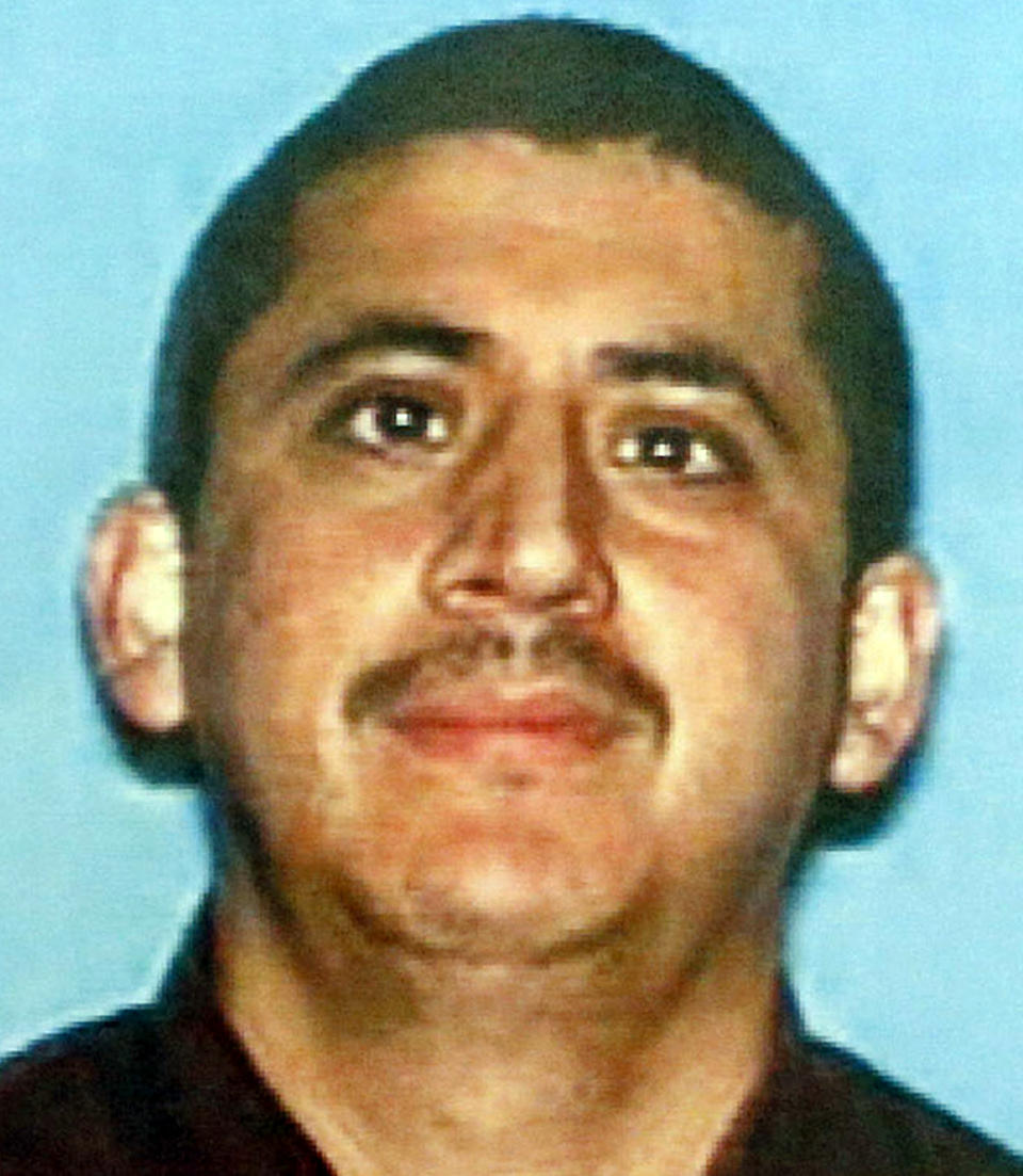 This undated photo provided by the Los Angeles Police Department shows Ramiro Valerio. Valerio is one of three suspects arrested in a deadly fire that struck an apartment building in the Westlake district of Los Angeles in 1993, taking the lives of 12 people including the deaths of late-term fetuses. Police Chief Charlie Beck says two men were arrested Feb. 3, 2017, and a woman was already in custody in connection with the fire. One suspect was still being sought. (Los Angeles Police Department via AP)