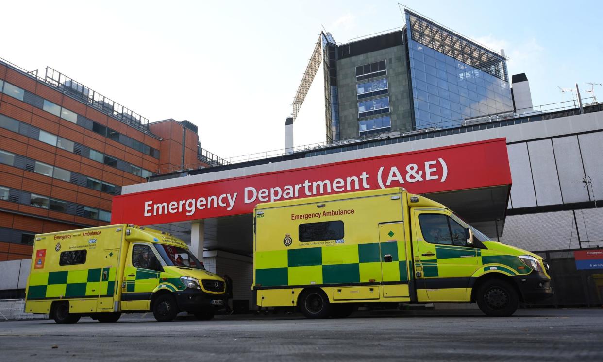 <span>Porters at Guy’s and St Thomas’ trust are collecting printed out blood test results and taking them to wards for medical staff to analyse.</span><span>Photograph: Victoria Jones/PA</span>