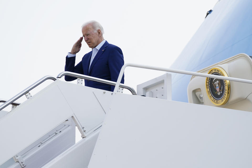 FILE - In this Monday, Sept. 13, 2021, file photo, President Joe Biden salutes before boarding Air Force One for a trip to visit the National Interagency Fire Center in Boise, Idaho, in Andrews Air Force Base, Md. On Friday, Sept. 17, 2021, The Associated Press reported on stories circulating online incorrectly asserting Biden had ordered the Department of Veterans Affairs to withhold health care benefits from unvaccinated veterans. “The President has not and will not withhold benefits to Veterans who choose not to be vaccinated,” Veterans Affairs Press Secretary Terrence L. Hayes said. (AP Photo/Evan Vucci, File)