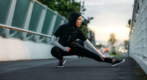 <span class="caption">Covering is a matter of personal choice, faith and, for many women, freedom.</span> <span class="attribution"><a class="link " href="https://www.shutterstock.com/image-photo/hijab-girl-exercising-on-walkway-bridge-1247806204" rel="nofollow noopener" target="_blank" data-ylk="slk:Jacob Lund | Shutterstock;elm:context_link;itc:0;sec:content-canvas">Jacob Lund | Shutterstock</a></span>