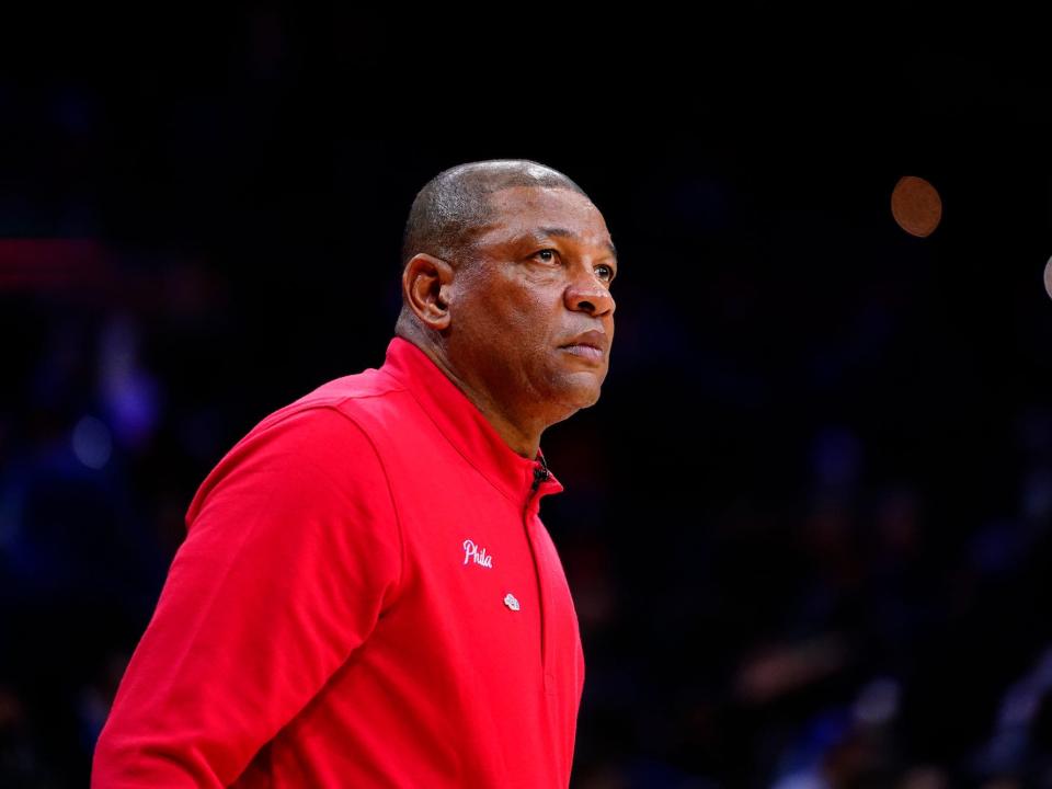 Doc Rivers looks on from the sidelines during a 76ers game.