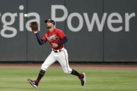 Atlanta Braves left fielder Nick Markakis catches a fly ball hit by Boston Red Sox's Christian Arroyo during the fourth inning of a baseball game Friday, Sept. 25, 2020, in Atlanta. (AP Photo/John Amis)