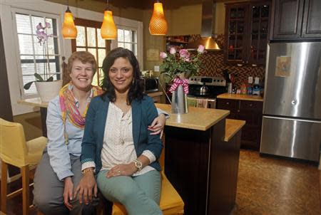 Sophy Jesty (L), and Valeria Tanco pose at their home in Knoxville, Tennessee April 7, 2014. REUTERS/Wade Payne