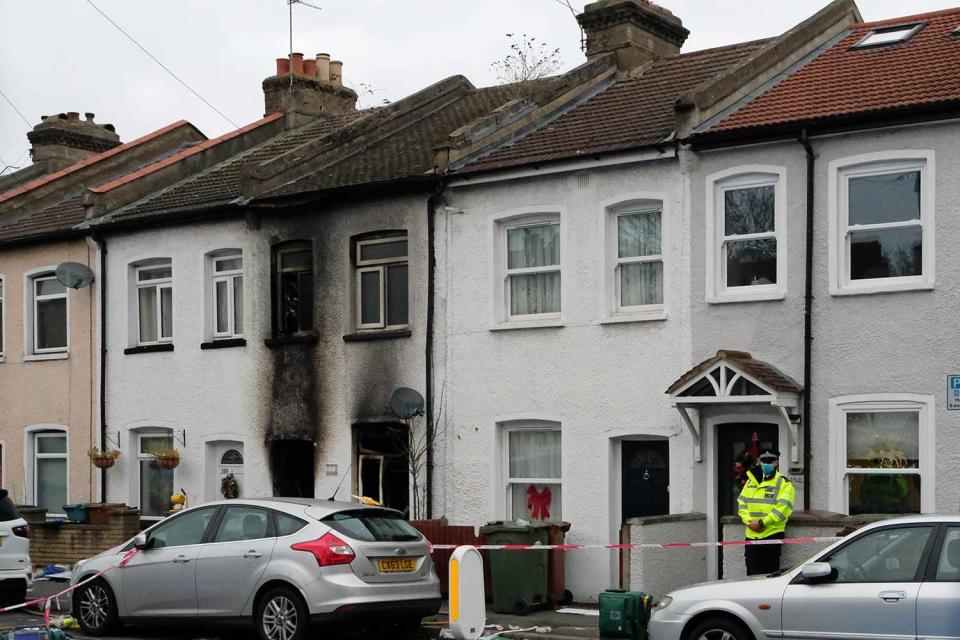 <p>SplashNews</p> A U.K. woman has been charged with manslaughter after her sons died in a house fire in London