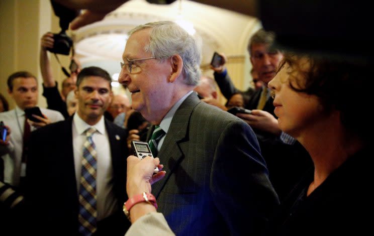 Senator Majority Leader Mitch McConnell is trailed by reporters as he walks to the Senate floor of the U.S. Capitol. (Photo: Kevin Lamarque/Reuters)