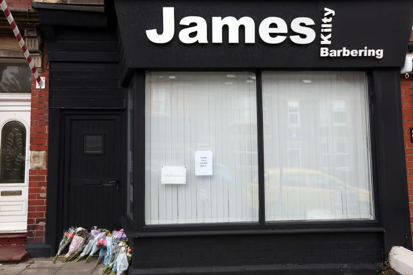 Flowers outside James Kilty barber shop on Warton terrace, Heaton Newcastle