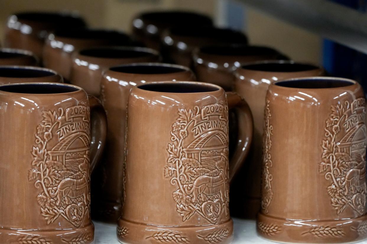 The steins' interior color will be "Patriot Blue" to represent the Ohio River. The exterior color, "MaltZin," will be a brown shade exclusively created for Oktoberfest Zinizinnati. The unique color is inspired by a Rookwood glaze from the early 1880s. The design will also feature the Oktoberfest logo, a wiener dog, a pretzel and the Daniel Carter Beard Bridge surrounded by hops.