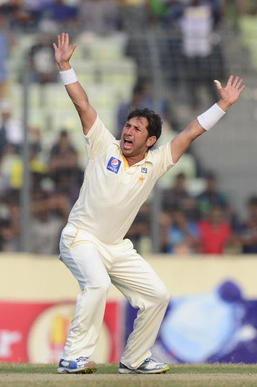 Pakistan cricketer Yasir Shah appeals unsuccessfully for leg before wicket decision against Bangladesh cricketer Imrul Kayes (L) during the third day of the second Test match at the Sher-e-Bangla National Cricket Stadium in Dhaka on May 8, 2015