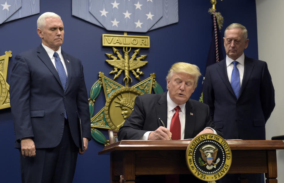 President Donald Trump, with Vice President Mike Pence, left, and Defense Secretary James Mattis