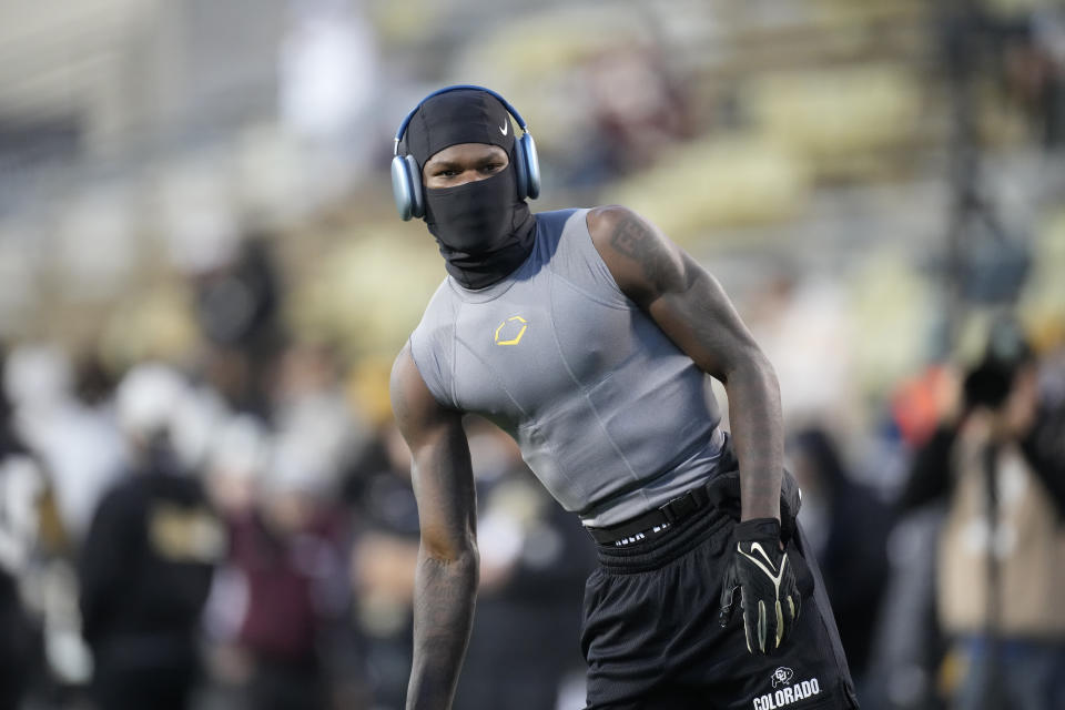 Colorado cornerback Travis Hunter warms up for the team's NCAA college football game against Stanford on. Friday, Oct. 13, 2023, in Boulder, Colo. (AP Photo/David Zalubowski)