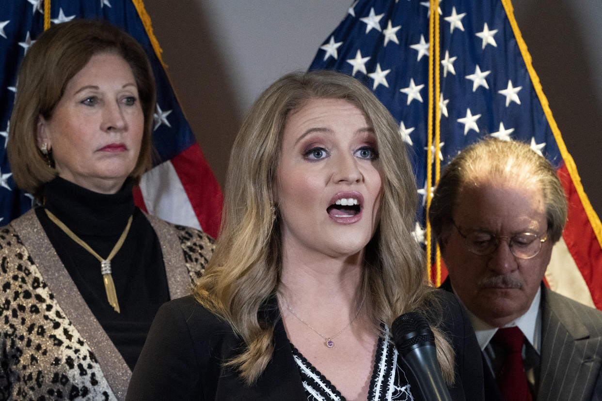 Trump attorneys Sidney Powell, left, and Jenna Ellis at Republican National Committee headquarters in Washington on Nov. 19. (Jacquelyn Martin/AP)