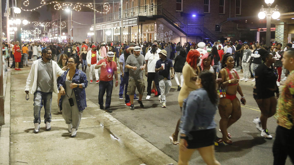 Revellers, pictured here in the Ybor City district in Tampa, Florida.