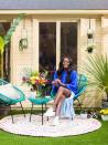 <p>'When I first moved in I had the space landscaped and added artificial grass, a patio and a pergola,' says AJ. Now, adding a furnished summer house has really transformed her outdoor space.</p>