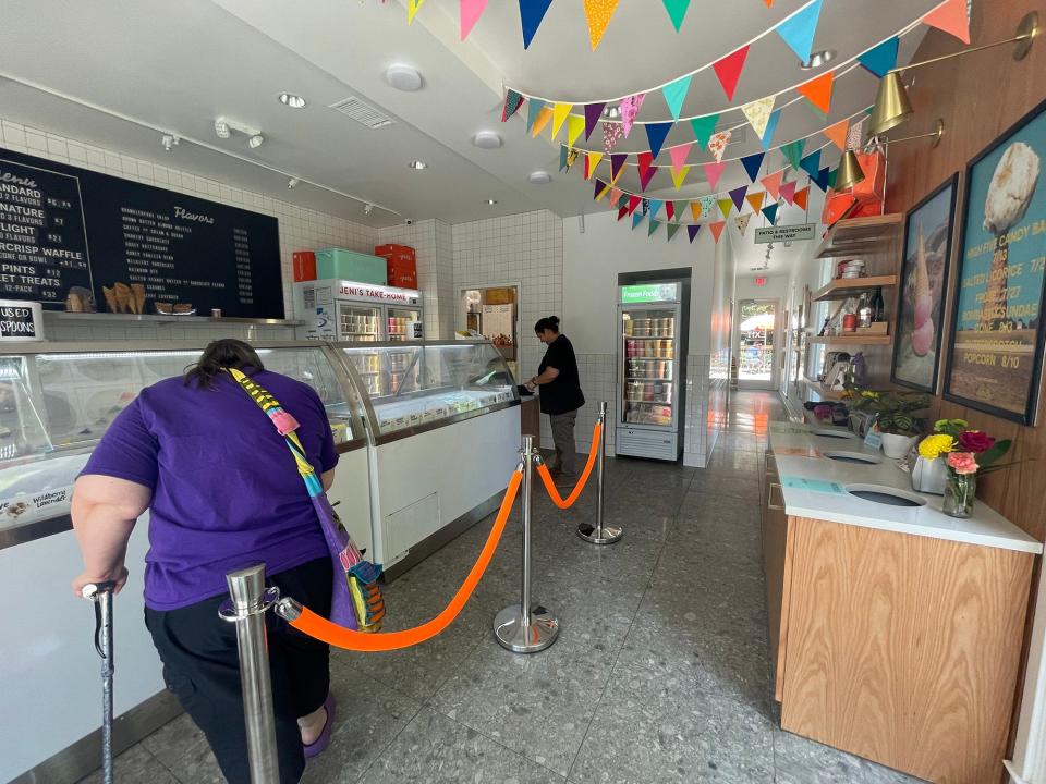 A customer checks out the selection of flavors at Jeni's Splendid Ice Creams in Athens, Ga. on Tuesday, Aug. 1, 2023. The chain location opened on July 27.