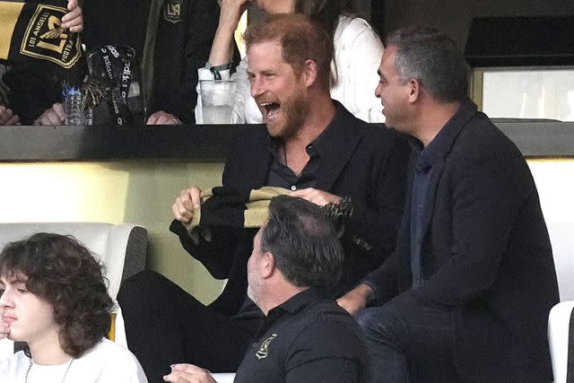 <p>AP Photo/Mark J. Terrill</p> Prince Harry watches Lionel Messi play soccer in Los Angeles