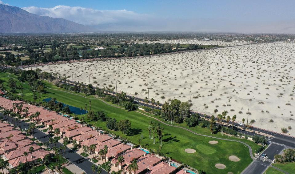 An undeveloped parcel of land at the intersection of Bob Hope Drive, top, and Frank Sinatra Drive, bottom, in Rancho Mirage, Calif., on Feb. 15, 2022.