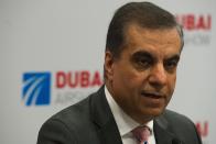 Air Arabia CEO Adel Abdullah al-Ali speaks at a news conference at the Dubai Airshow in Dubai, United Arab Emirates, Monday, Nov. 18, 2019. The Emirati budget carrier Air Arabia announced Monday the purchase of 120 new Airbus planes in deal worth $14 billion. (AP Photo/Jon Gambrell)