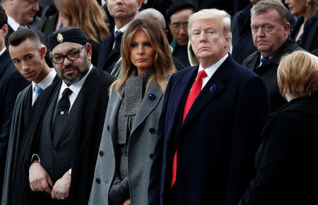 El presidente de Estados Unidos, Donald Trump, y su esposa Melania junto al rey de Marruecos, Mohammed VI (izquierda) y su hijo. 11 de n November 11, 2018. REUTERS/Benoit Tessier/Pool - RC1ACC7E14A0