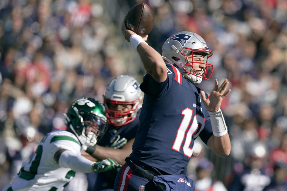 New England Patriots quarterback Mac Jones (10) throws during the first half of an NFL football game against the New York Jets, Sunday, Oct. 24, 2021, in Foxborough, Mass. (AP Photo/Steven Senne)