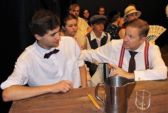 Thomas Hoover and George Patterson in a courtroom scene from "Inherit the Wind" being presented at the Renner Theater.