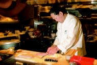 Chef Massaharu Morimoto prepares sushi at his restaurant, Morimoto, in Philadelphia.