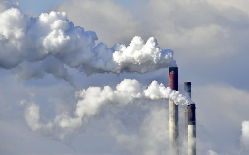 A coal-fired power station steams in the cold winter air in Gelsenkirchen, February 2018