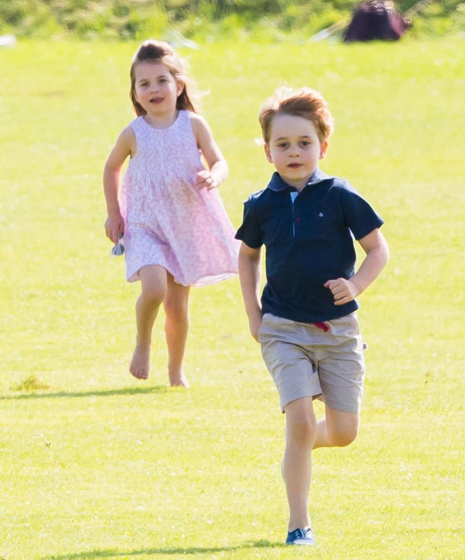 <p>The Cambridge children prove they're just like us by playing in a totally random field at a polo match in 2018. Princess Charlotte even went barefoot!</p>