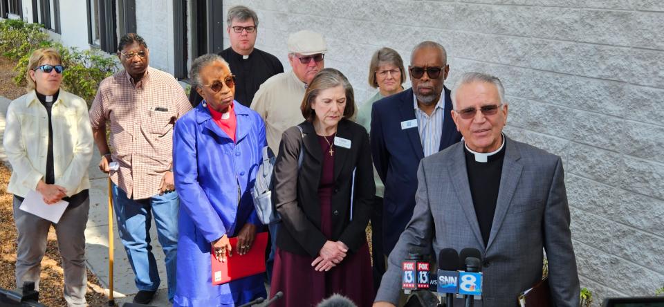 A group called Stronger Together Reaching Equality Across Manatee, comprised of 15 multicultural and interfaith congregations from Manatee County, speaks to media on Monday after a meeting with Manatee County Sheriff Rick Wells and representatives from every law enforcement agency in Manatee County.