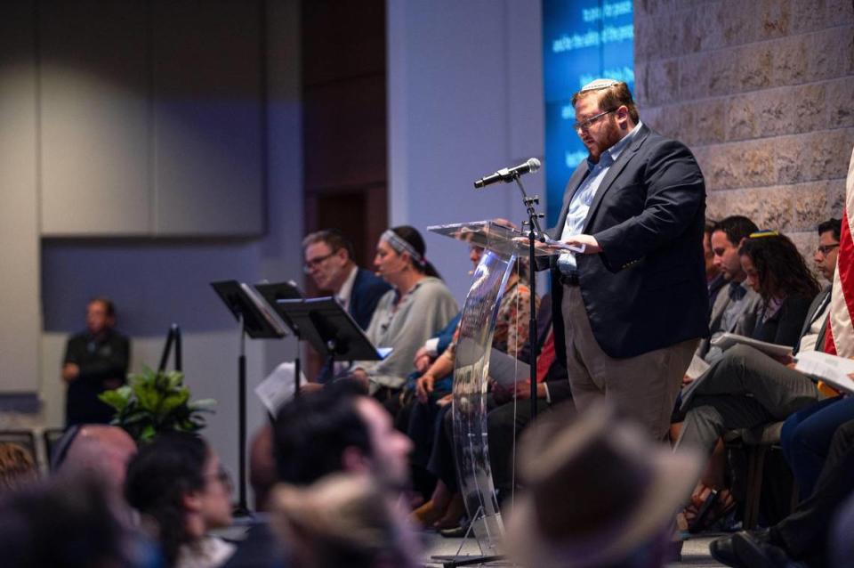 Rabbi Sam Stern prays with congregants on Monday, Oct. 9, 2023, at The Temple, Congregation B’nai Jehudah on, in Overland Park. Rabbi Stern and other local Rabbis led community members in prayer in a demonstration of support and mourning for citizens of Israel.