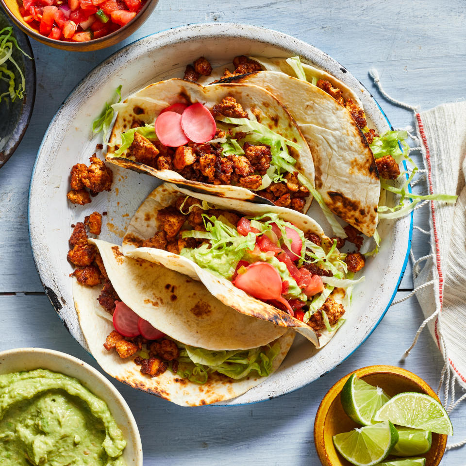 <p>Take taco night in a new direction with these healthy vegan tacos. We've swapped crumbled tofu for the ground beef, without sacrificing any of the savory seasonings you expect in a taco. You can also use the filling in burritos, bowls, taco salads and to top nachos. <a href="https://www.eatingwell.com/recipe/272203/beefless-vegan-tacos/" rel="nofollow noopener" target="_blank" data-ylk="slk:View Recipe;elm:context_link;itc:0;sec:content-canvas" class="link ">View Recipe</a></p>