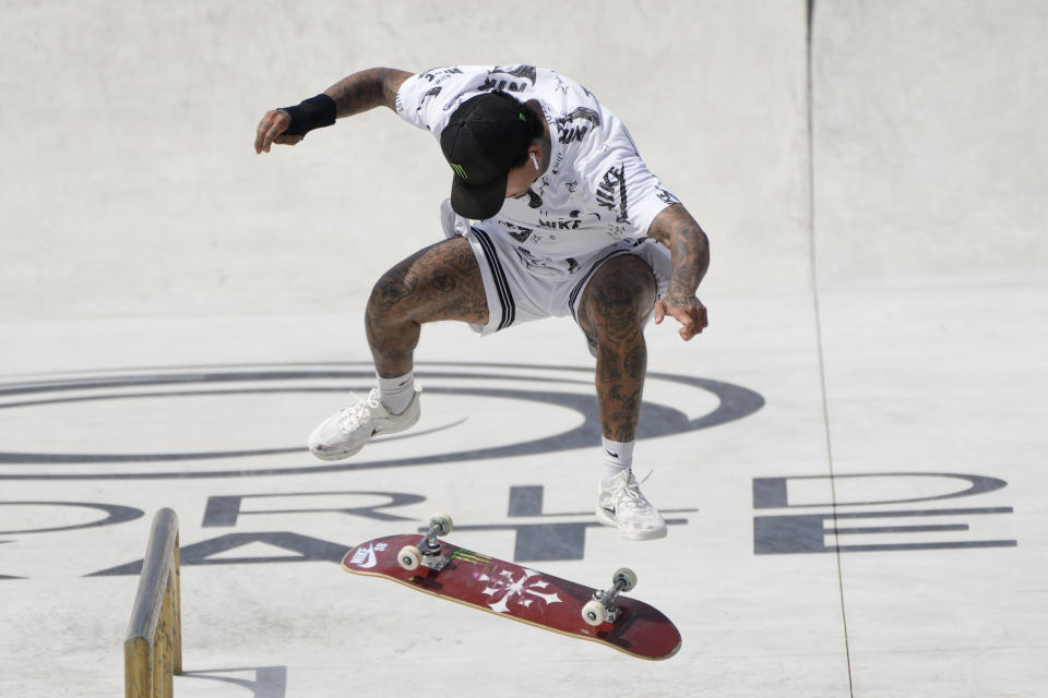 FILE - In this June 6, 2021, file photo, Nyjah Huston, of the United States, competes in a Street Skateboarding World Championships final, a qualifying event for Tokyo Olympic Games, in Rome. Skating is one of four debut Olympic sports, along with karate, surfing and sport climbing. (AP Photo/Alessandra Tarantino, File)