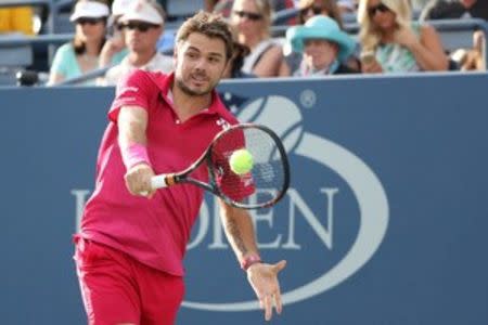 Stan Wawrinka of Switzerland returns a shot to Daniel Evans of the United Kingdom on day six of the 2016 U.S. Open tennis tournament at USTA Billie Jean King National Tennis Center. Mandatory Credit: Anthony Gruppuso-USA TODAY Sports