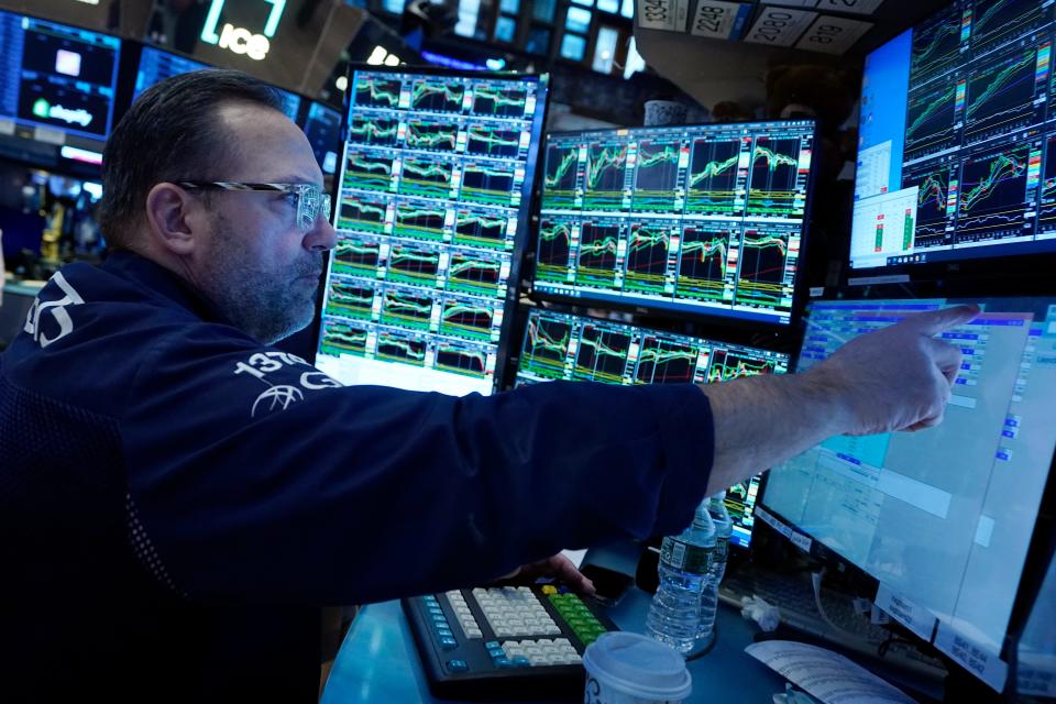 Specialist Anthony Matesic works at his post on the floor of the New York Stock Exchange, Wednesday, Jan. 31, 2024.