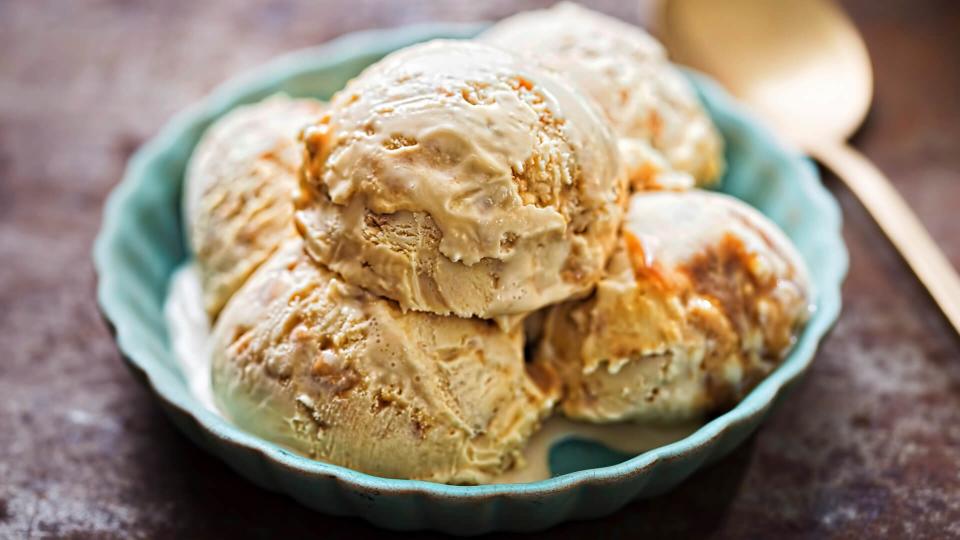 Salted caramel ice creams on blue plate.