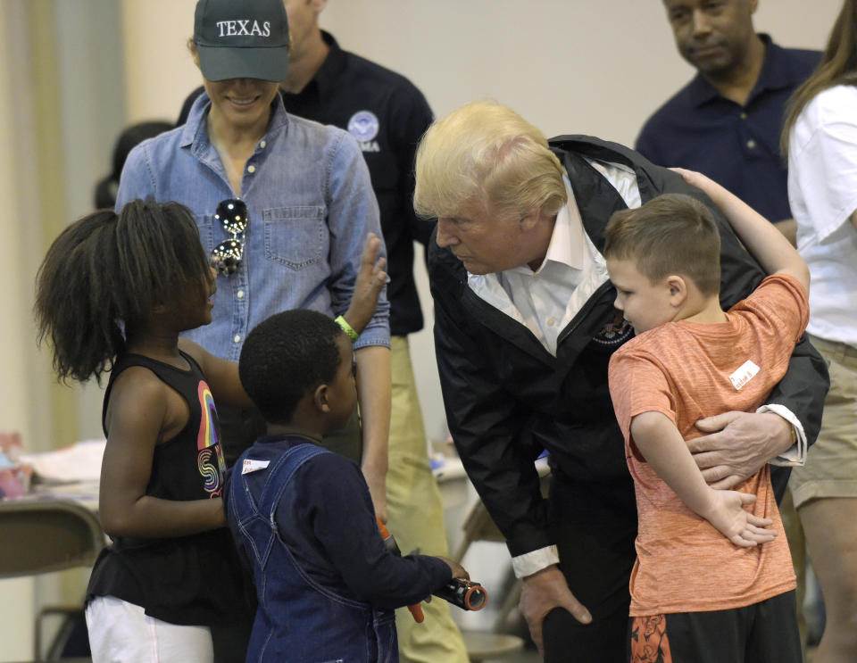 <p>President Donald Trump and Melania Trump meet people impacted by Hurricane Harvey during a visit to the NRG Center in Houston, Saturday, Sept. 2, 2017. (Photo: Susan Walsh/AP) </p>