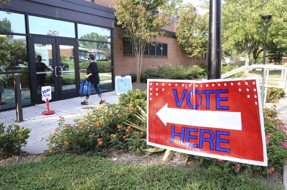 A voters enters Precinct #25 at the West Charlotte Recreation Center, Tuesday, September 10, 2019 as they cast their ballots in the party primaries and in the 9th District race between Dan Bishop and Dan McCready. Voters across Charlotte and the region went to the polls to vote in local Democrat and Republican primaries, while others, in the now infamous 9th District, voted to send either Dan McCready or Dan Bishop to represent them in Congress. (John D. Simmons/The Charlotte Observer via AP)