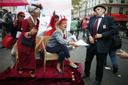 Protesters take part in a demonstration over pension reforms in Paris, September 10, 2013. REUTERS/Charles Platiau