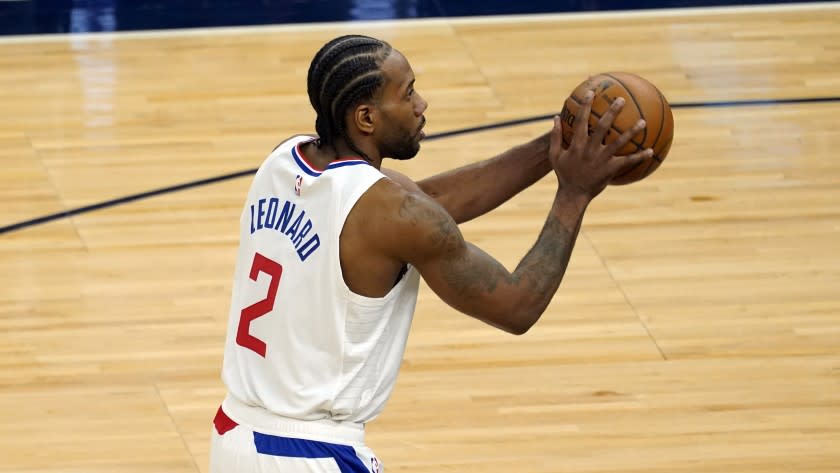 Los Angeles Clippers' Kawhi Leonard (2) plays against the Minnesota Timberwolves in an NBA basketball game, Wednesday, Feb. 10, 2021, in Minneapolis. (AP Photo/Jim Mone)