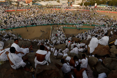 Muslim pilgrims gather on Mount Mercy on the plains of Arafat during the annual haj pilgrimage, outside the holy city of Mecca, Saudi Arabia August 20, 2018. REUTERS/Zohra Bensemra