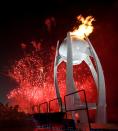 <p>Fireworks erupt as the cauldron is lit with the Olympic flame during the opening ceremony of the Pyeongchang 2018 Winter Olympic Games at the Pyeongchang Stadium on February 9, 2018. / AFP PHOTO / POOL / FRANCK FIFE </p>