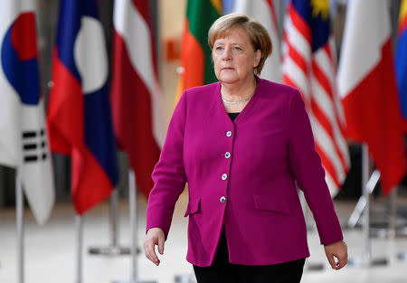 FILE PHOTO: German Chancellor Angela Merkel arrives at the ASEM leaders summit in Brussels, Belgium October 19, 2018. REUTERS/Toby Melville/File Photo