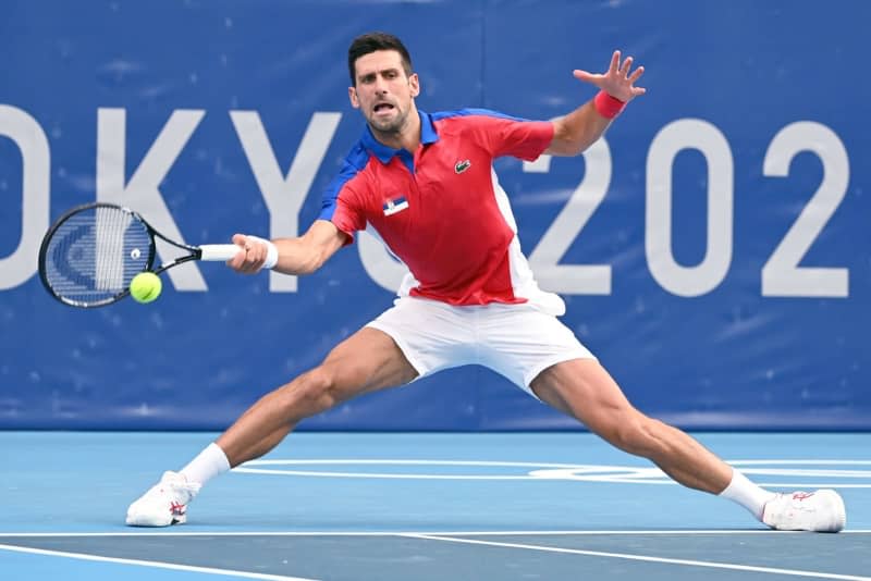 Serbian tennis player Novak Djokovic in action against Germany's Jan-Lennard Struff during their Men's Singles 2nd Round tennis match at the Olympic Games Tokyo 20201 at Ariake Tennis Park. Novak Djokovic remains at the top of the ATP Rankings,ahead of Spain's Carlos Alcaraz. Marijan Murat/dpa