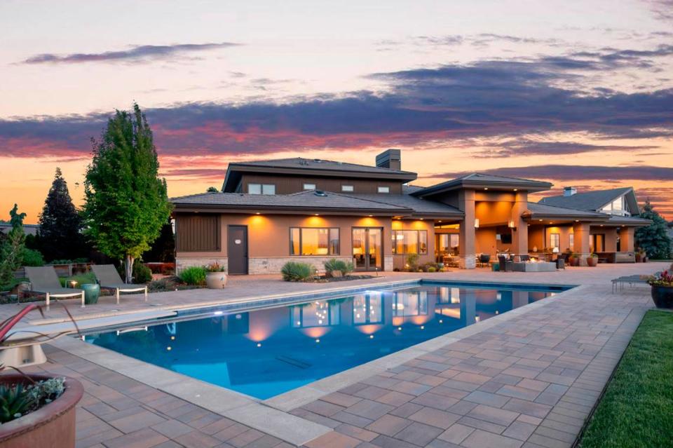 The $5.5 million home includes a large swimming pool in the back, shown here.