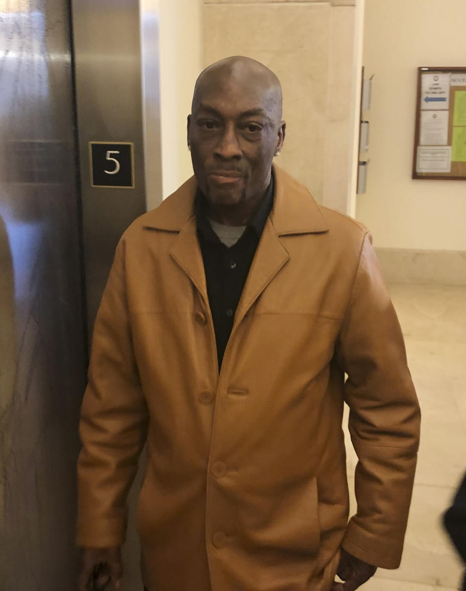 Plaintiff DeWayne Johnson, a school groundskeeper who says Roundup weed-killer caused his cancer, leaves a courtroom in San Francisco, Wednesday, Oct. 10, 2018. A San Francisco judge said in a tentative ruling Wednesday that she would order a new trial in a $289 million judgment against agribusiness giant Monsanto brought by Johnson. (AP Photo/Paul Elias)