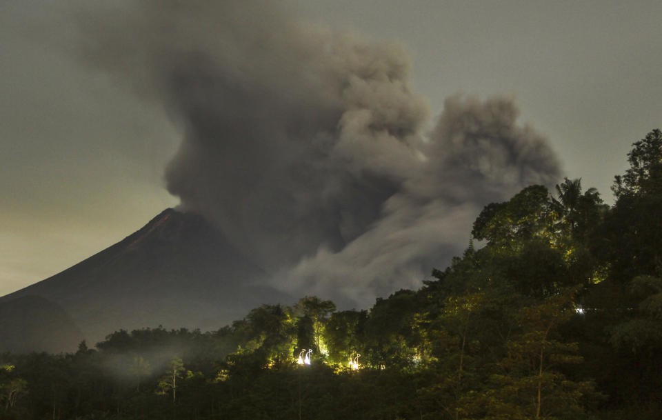 Hot cloud of volcanic materials run down the slope of Mount Merapi during an eruption in Sleman, Indonesia Friday, June 25, 2021. Indonesia’s most volatile volcano erupted Friday, releasing plumes of ash high into the air and sending streams of lava with searing gas clouds flowing down its slopes. (AP Photo/Slamet Riyadi)