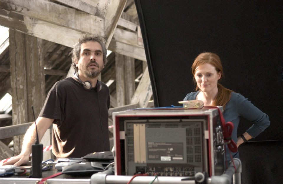 Alfonso Cuaron with Julianne Moore on the set of <em>Children of Men</em>.