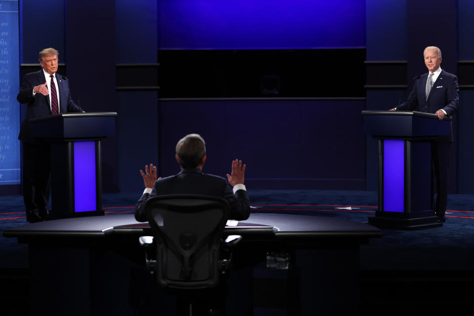 Then-President Donald Trump and Then-Democratic presidential nominee Joe Biden participate in a debate  (Scott Olson / Getty Images file)