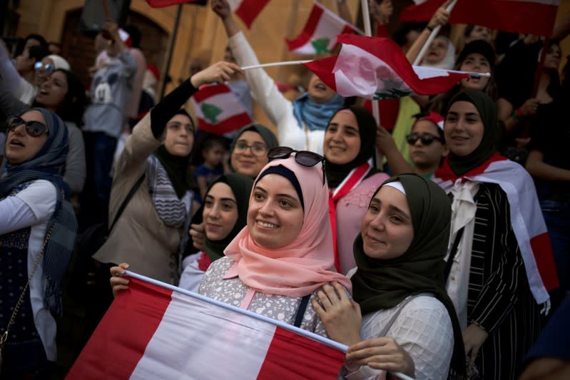 Demonstrators take part in an anti-government protest in downtown Beirut