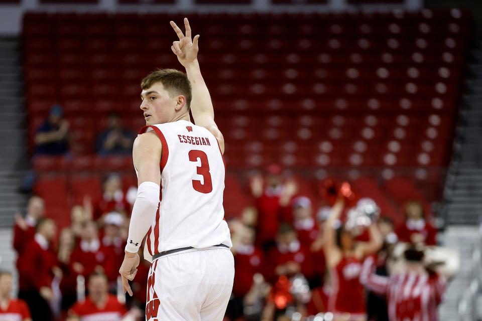 MADISON, WISCONSIN - MARCH 14: Connor Essegian #3 of the Wisconsin Badgers reacts after a made three point shot by Steven Crowl during the first half of the game at Kohl Center on March 14, 2023 in Madison, Wisconsin. (Photo by John Fisher/Getty Images)